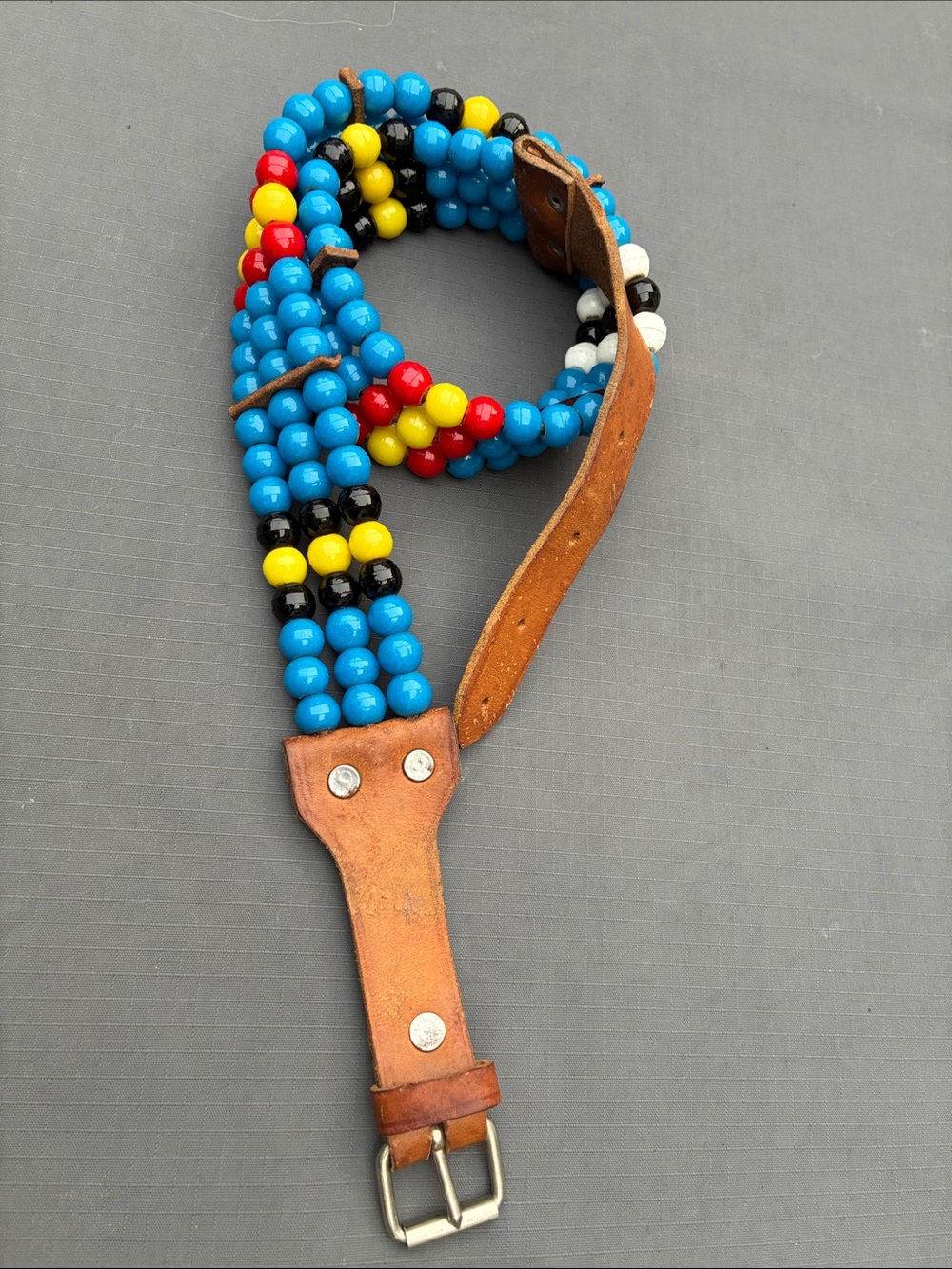 Vintage leather beaded belt. Source unknown. Nice handmade accessory